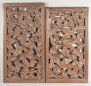 TWO FINE, LARGE 19TH CENTURY MALAYSIAN POLYCHROME GILT CARVED WOODEN PANELS. 79cm x 45cm and 84cm