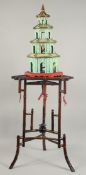A BAMBOO AND FAUX CORAL CHINOISERIE TABLE, with fitted model of a pagoda and birds, table 69.5cm