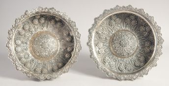 A PAIR OF TURKISH HAMMAN SILVER CIRCULAR BOWLS, each embossed and chased with foliate decoration and
