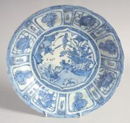A CHINESE BLUE AND WHITE KRAAK PORCELAIN BOWL, painted with a central panel of birds by water and