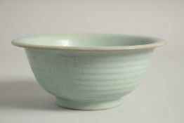 A CHINESE RUI WARE CELADON PORCELAIN BOWL. 18.cm diameter