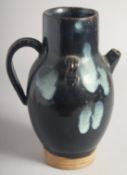 A CHINESE JUN STYLE GLAZED POTTERY EWER, 22.5cm high.