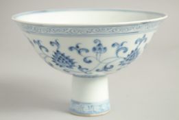 A CHINESE BLUE AND WHITE PORCELAIN PEDESTAL BOWL painted with lotus and vine decoration with six-