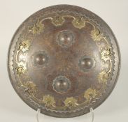 A PERSIAN QAJAR STEEL SHIELD, with gold vine and foliate decoration, the centre with four raised