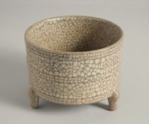 A CHINESE CRACKLE GLAZED GUAN-TYPE TRIPOD PORCELAIN CENSER. 15.5cm diameter
