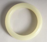 A CHINESE JADE BANGLE.