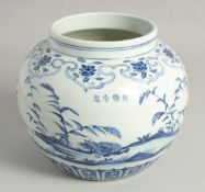 A CHINESE BLUE AND WHITE PORCELAIN JAR painted with waterfowl, with four-character mark. 19cm high