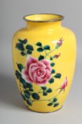 A JAPANESE YELLOW GROUND CLOISONNE VASE, decorated with floral spray. 24cm high