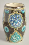 AN ISLAMIC GLAZED POTTERY VASE, 18cm high.