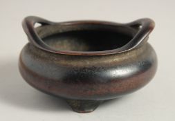 A GOOD CHINESE BRONZE TRIPOD CENSER, the base with six-character mark, 11.5cm diameter.