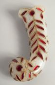 A MUGHAL STYLE HARDSTONE DAGGER HANDLE, 14cm at widest point.