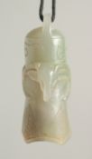 A CHINESE CARVED JADE PENDANT on string, jade 6cm.
