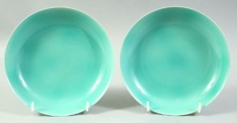 A PAIR OF CHINESE TURQUOISE GLAZE PORCELAIN DISHES, the base of each with six character mark, 17cm