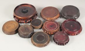 A GOOD COLLECTION CHINESE HARDWOOD STANDS, various sizes, (9).