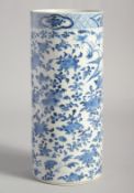 A CHINESE BLUE AND WHITE PORCELAIN CYLINDRICAL VASE, painted with birds and flora, the base with