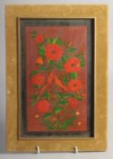 A PERSIAN QAJAR PAINTED AND LACQUERED FLORAL PANEL encased in a velvet and wood frame, double-sided,