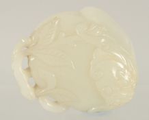 A FINE QUALITY CHINESE CARVED AND PIERCED JADE FRUIT, 5cm.