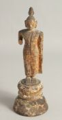 A THAI CARVED WOOD BUDDHA FIGURE, 27cm high.