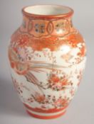 A JAPANESE KUTANI PORCELAIN VASE, painted with birds and flora with fine gilt highlights,