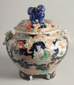 A VERY LARGE JAPANESE IMARI TWIN HANDLE KORO AND COVER, painted with a dragon as well as various