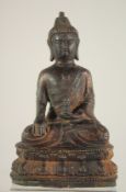 A SMALL THAI BRONZE SEATED BUDDHA, 13cm high.