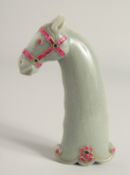 A MUGHAL STYLE CARVED JADE HORSE FORM DAGGER HANDLE, onlaid with decorative wire work and semi-