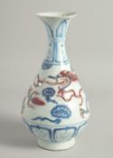 A CHINESE BLUE, WHITE, AND UNDERGLAZE RED PORCELAIN YUHUCHUNPING VASE, with relief decoration