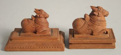 TWO INDIAN CARVED WOOD FIGURES.