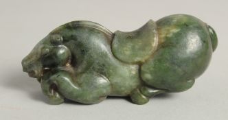 A CHINESE CARVED JADE FIGURE OF A HORSE, 9cm long.
