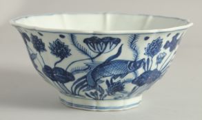 A CHINESE BLUE AND WHITE PORCELAIN PETAL FORM BOWL, the exterior painted with fish amongst aquatic