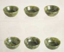 SIX SMALL CHINESE SPINACH JADE CUPS, each 4.5cm diameter, (6).