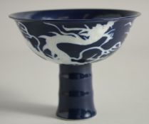 A CHINESE SACRIFICIAL BLUE GLAZE STEM CUP, the bowl exterior decorated with white dragon. Bowl