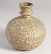 A FINE INDIAN BRASS BULBOUS HUQQA BASE, with floral motif decoration. 15cm high