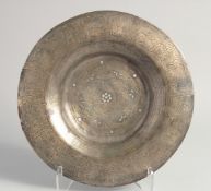 A RARE 10TH CENTURY PERSIAN GHAZNAVID SILVER AND COPPER INLAID HIGH TIN BRONZE DISH, 32cm diameter.