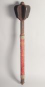 AN OTTOMAN IRON MACE, with red cotton cloth grip. 57.5cm long