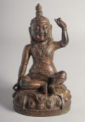 A TIBETAN BRONZE FIGURE OF SIDDHA, 23cm high.