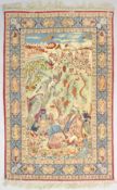A PART-SILK PICTORIAL PERSIAN RUG, pale green ground, a seated elderly male figure in a garden