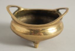 A CHINESE MINIATURE BRASS CENSER, the base with six-character mark, 7cm handle to handle.