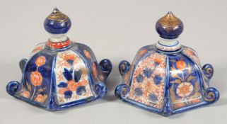 A PAIR OF JAPANESE IMARI PORCELAIN LIDS. (af) 13cm wide