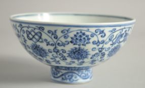 A CHINESE BLUE AND WHITE PORCELAIN BOWL, the exterior finely decorated with lotus and auspicious