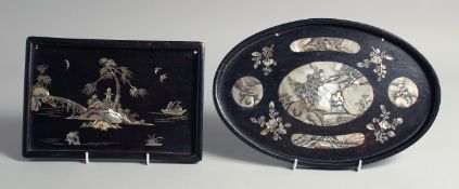 TWO 19TH CENTURY JAPANESE MOTHER OF PEARL INLAID TRAYS, 31.5cm x 21cm and 25cm x 17cm.