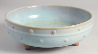 A CHINESE JUN STYLE GLAZED POTTERY CENSER, the exterior with raised bosses, the censer standing