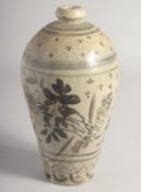 A CHINESE CRACKLE GLAZE MEIPING VASE, painted with flora and birds, 25cm high.