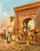 Frederick Goodall (1822-1904) British, Arab figures and camels gathered beneath an archway in a