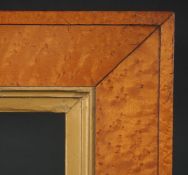 A late 19th Century birds eye maple frame with gilt slip, rebate size 21.5