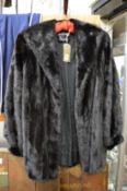 A Harrod's ladies' mink jacket, size 8.