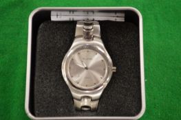 A boxed gent's wristwatch.