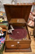 An Apollo oak cased gramophone.