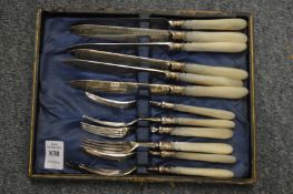 A set of mother-of-pearl handled fish knives and forks.