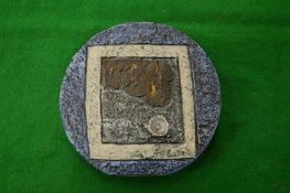 A small Troika circular vase.